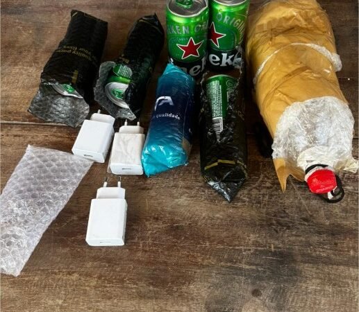 Policiais penais apreendem bebidas alcoólicas e carregadores de celulares que seriam arremessados para unidade prisional em Várzea Grande