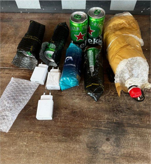 Policiais penais apreendem bebidas alcoólicas e carregadores de celulares que seriam arremessados para unidade prisional em Várzea Grande