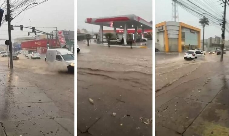 Chuva causa alagamento na Avenida Carmindo de Campos em Cuiabá